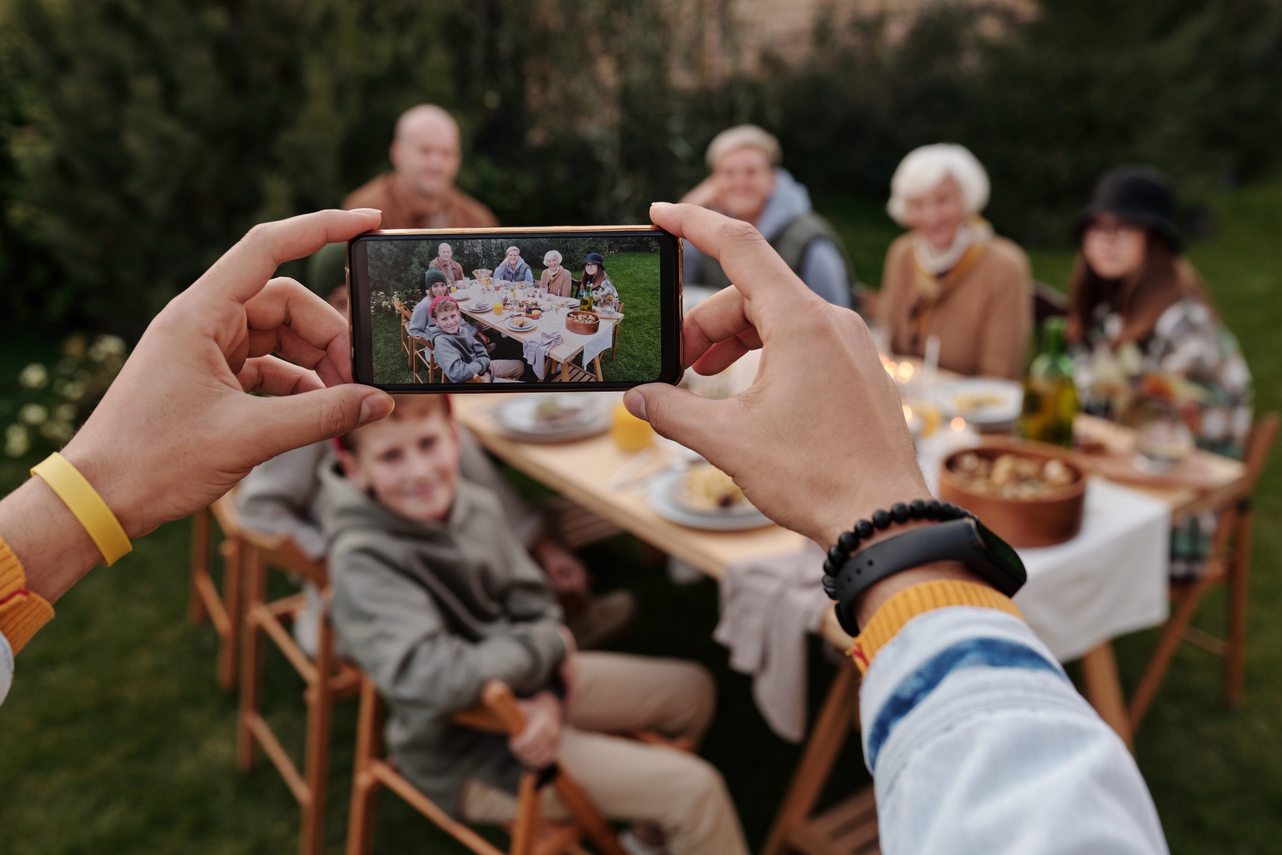 Picture of family around a picnic table.