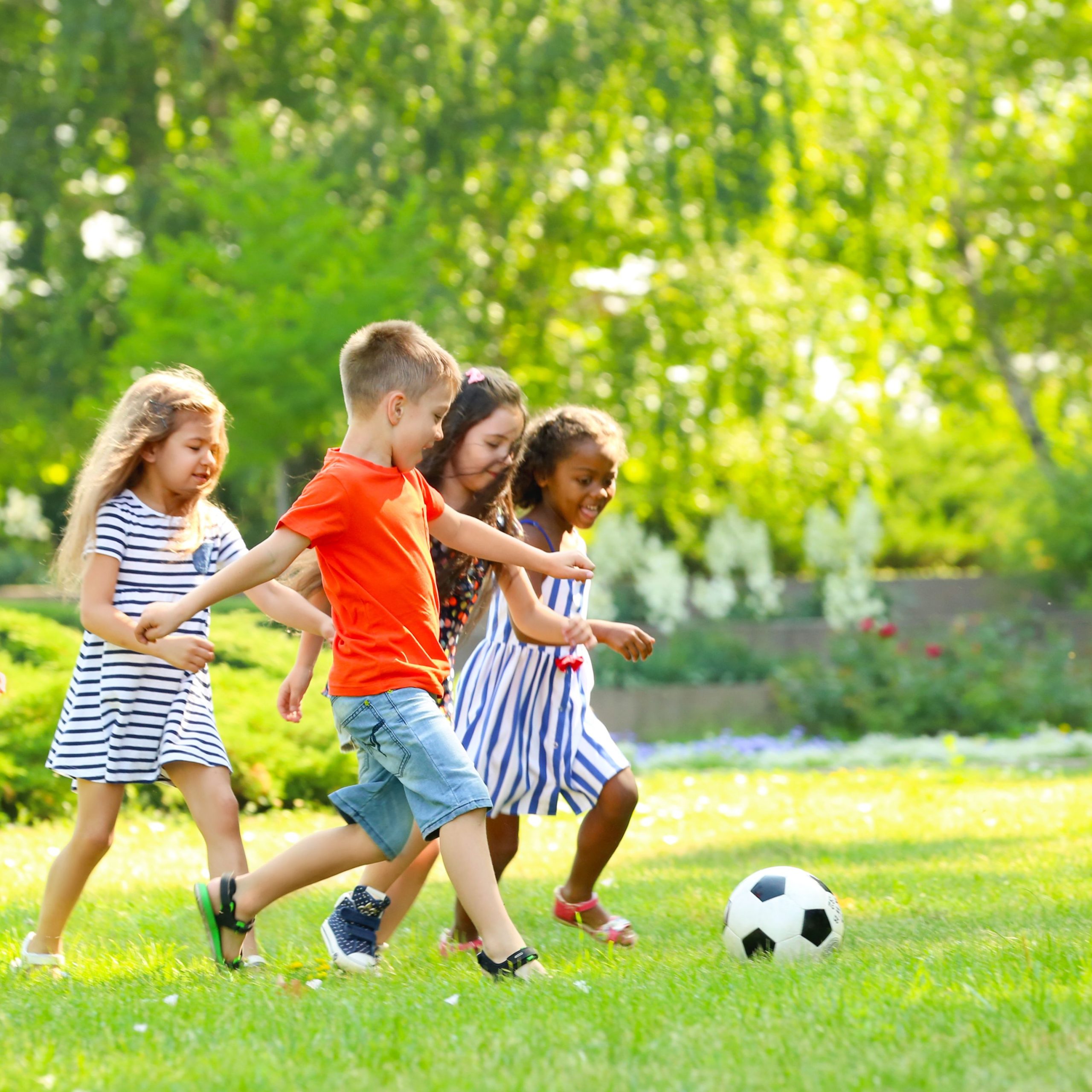 Decorative photo of children playing outside.