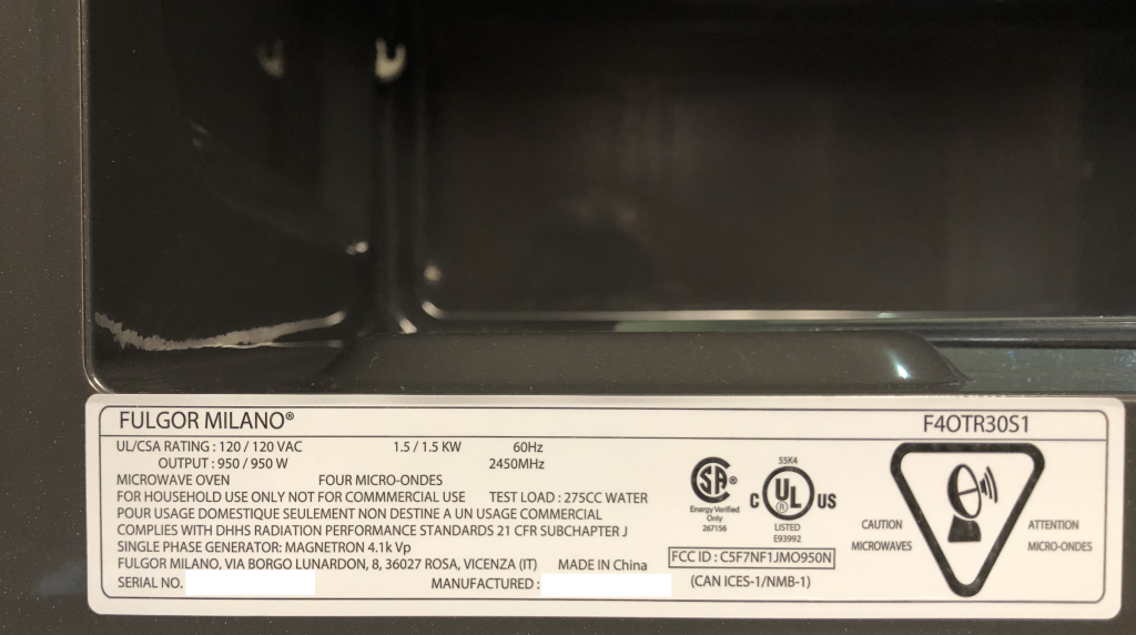 A photograph of the sticker inside Dr. Pasquale's microwave oven. It notes the make and model of the microwave, among other things. Notably: the frequency of operation is 2450 MHz and the power rating is 1.5 kW.