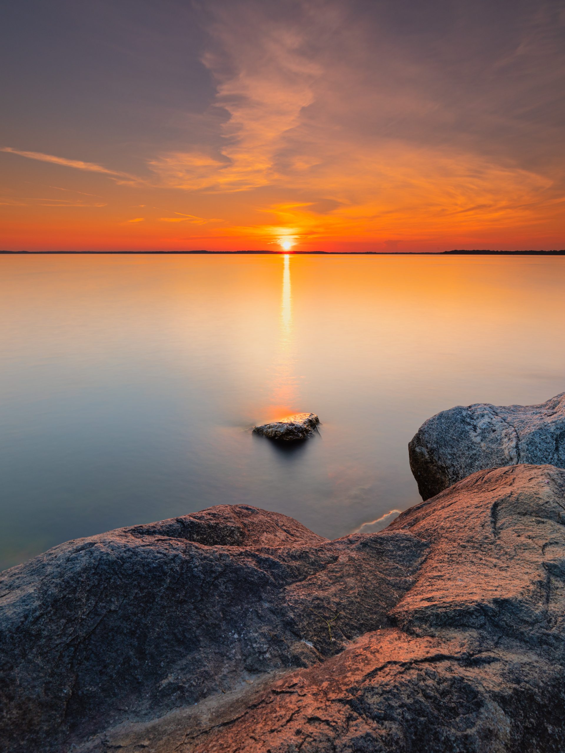 Striking sunset/sunrise photograph lakeside in Madison, Wisconsin.