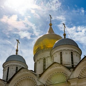 Photograph showing the domes and crosses of the Cathedral of the Archangel in the Kremlin's Cathedral Square, Moscow, Russia.