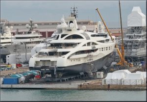 Photo showing immense yacht in dry dock.